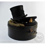 A Christies of London top hat, named on the leather interior, interior aperture 15.5cm x 19.