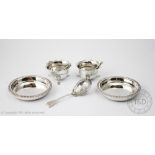 A pair of silver circular pin dishes, Gold and Silversmiths Co, London 1908, 9cm diam,