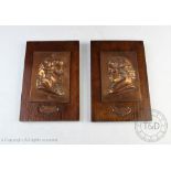 Two early 20th century embossed copper portrait plaques of composors Beethoven and Mozart,