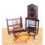 Two early 19th century solid seat dining chairs, one in oak the other in stained wood,