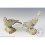 A pair of French painted and cast iron bird finials,