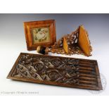 A 19th century carved oak panel, decorated with a gothic arch, 55cm x 25cm,
