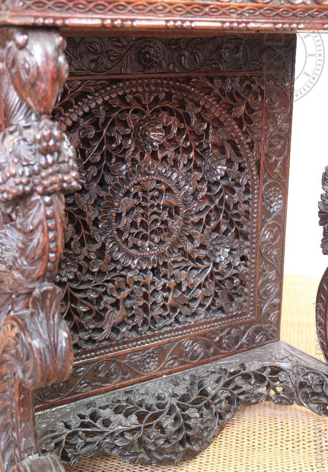 A late 19th century Anglo Indian / Burmese carved hardwood Davenport, - Image 4 of 9