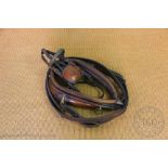 A tan leather and brass pony / horse harness, possibly Welsh,