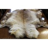 Two reindeer skin fur rugs / throws