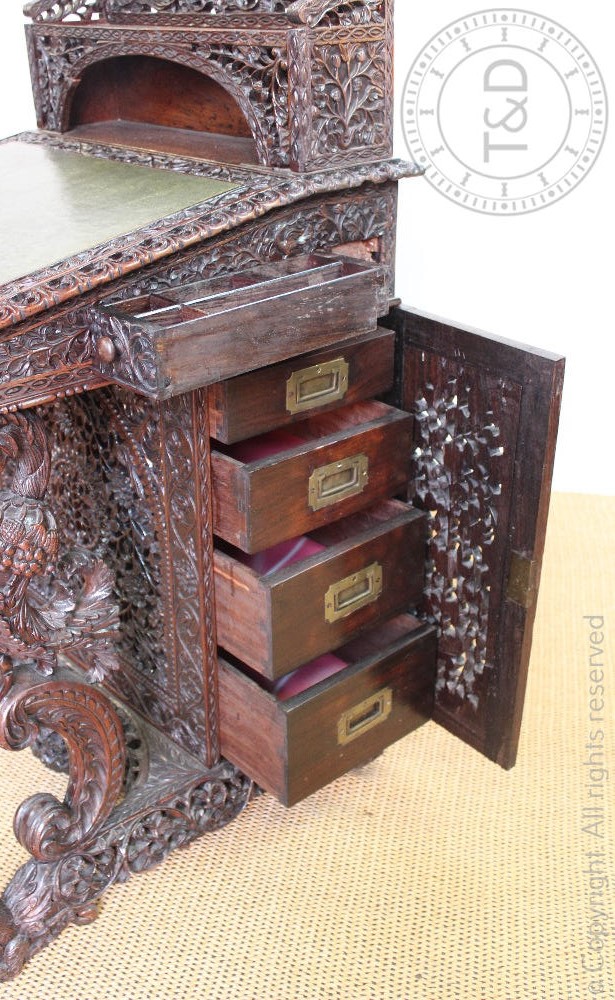 A late 19th century Anglo Indian / Burmese carved hardwood Davenport, - Image 8 of 9