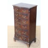 A walnut bow front pillar chest, with six drawers, on bracket feet 95cm H x 38cm W x 45cm D,