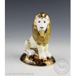 A Royal Crown Derby limited edition paperweight modelled as a Heraldic Lion,