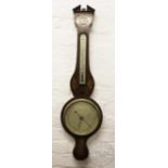 An early 19th century inlaid mahogany wheel barometer, the sial signed M.
