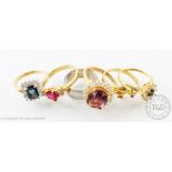 A collection of five dress rings, to include; blue, purple, red and 'pearl' set rings,