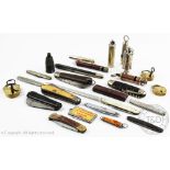 A collection of whistles, padlocks and pocket knives,