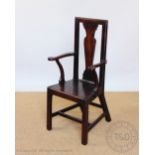 A George III mahogany child's high back chair / correction chair,