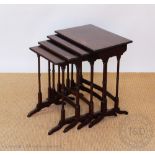 An Edwardian quartetto nest of mahogany tables, on turned legs,