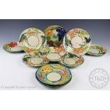 Paul Jackson; ten assorted studio pottery plates, each decorated with humming birds,
