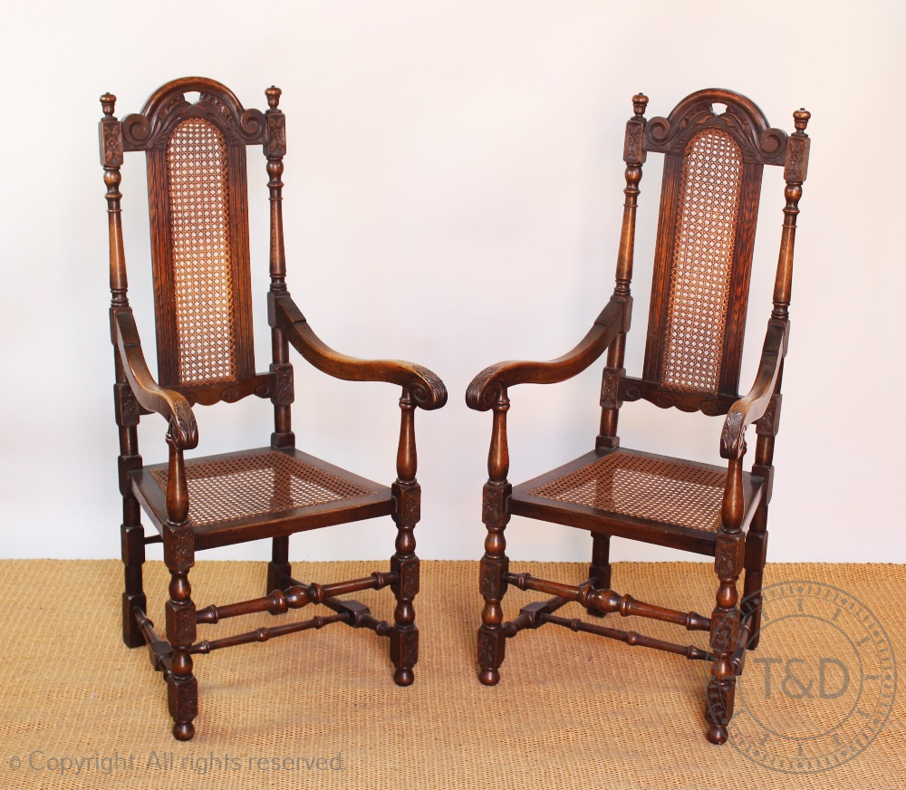 A pair of Carolean style oak side chairs,