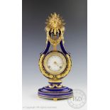 A Victorian and Albert Museum Marie Antoinette style clock, of lyre shape,