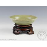 A Chinese Longquan type celadon shallow bowl, 16th century,