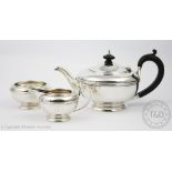 A silver bachelor's tea service, I S Greenberg and Co, Birmingham 1927, each of circular form,