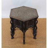 An Anglo-Indian / Burmese carved hardwood hexagonal occasional table,