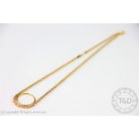 A 22ct yellow gold band, 2.3 grams and a '9kt' rope twist necklace, 3.