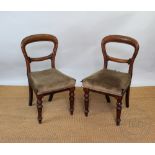 A set of Victorian carved walnut dining chairs, stamped for E. J.