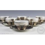A set of six continental silver teacups and saucers, circa 1910,