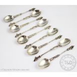 Nine Dutch silver Apostle spoons, each with figural terminal and twisted stem, gross weight 5.