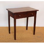 An early 19th century yew wood side table, with single drawer, on tapered square legs,