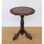A late 19th century Anglo Indian carved and stained soft wood table,