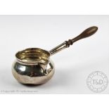 An Irish silver brandy warmer, George II circa 1750, of typical cauldron,