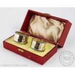 A pair of cased silver napkin rings, James Dixon & Sons Ltd, Sheffield 1944,