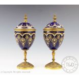 A pair of 19th century French gilt brass and enamel cups and covers, with 'jewelled' detailing,