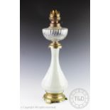A French porcelain Pate-sur-pate oil lamp,