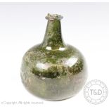 An 18th century green glass mallet shaped wine bottle, with later initials RG,