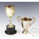 A George V silver trophy cup, Charles Boyton & Son, London 1919, with two animals head handles,