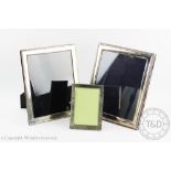 Three silver photograph frames, comprising; Sheffield 2011, with slender reeded design,