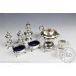 A silver four piece cruet set, Birmingham 1939, with a silver pepperette, a Chester silver salt,