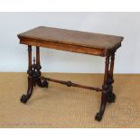 A Victorian carved walnut card table,