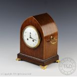 An Edwardian rosewood lancet shaped eight day mantel clock,