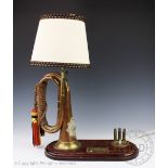 An unusual table lamp of military interest,