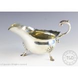 A George V silver sauce boat, Walker and hall, Sheffield 1913,