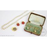 A single strand untested pearl necklace with barrel shaped, paste set clasp,