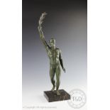 After Pierre Le Faguays, an Art Deco patinated spelter model of a victorious male athlete,