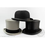 A Lock & Co silk top hat, 16.