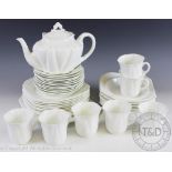 A Shelley china thirty eight piece part tea and dessert service, with moulded detailing,