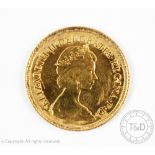 An Elizabeth II gold half sovereign dated 1982,