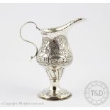 A George V silver cream jug, George Nathan & Ridley Hayes, Chester 1913,
