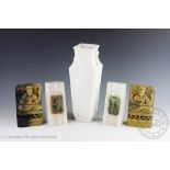 A pair of carved soapstone figural booked ends, each carved as Guanyin seated on a lotus throne,