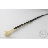 A late 19th/early 20th century ivory handled and baleen cane,
