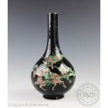 A Chinese porcelain famille verte bottle vase, Wanli six character,